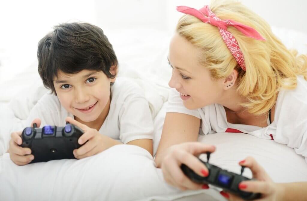 photo of mom and son playing video games